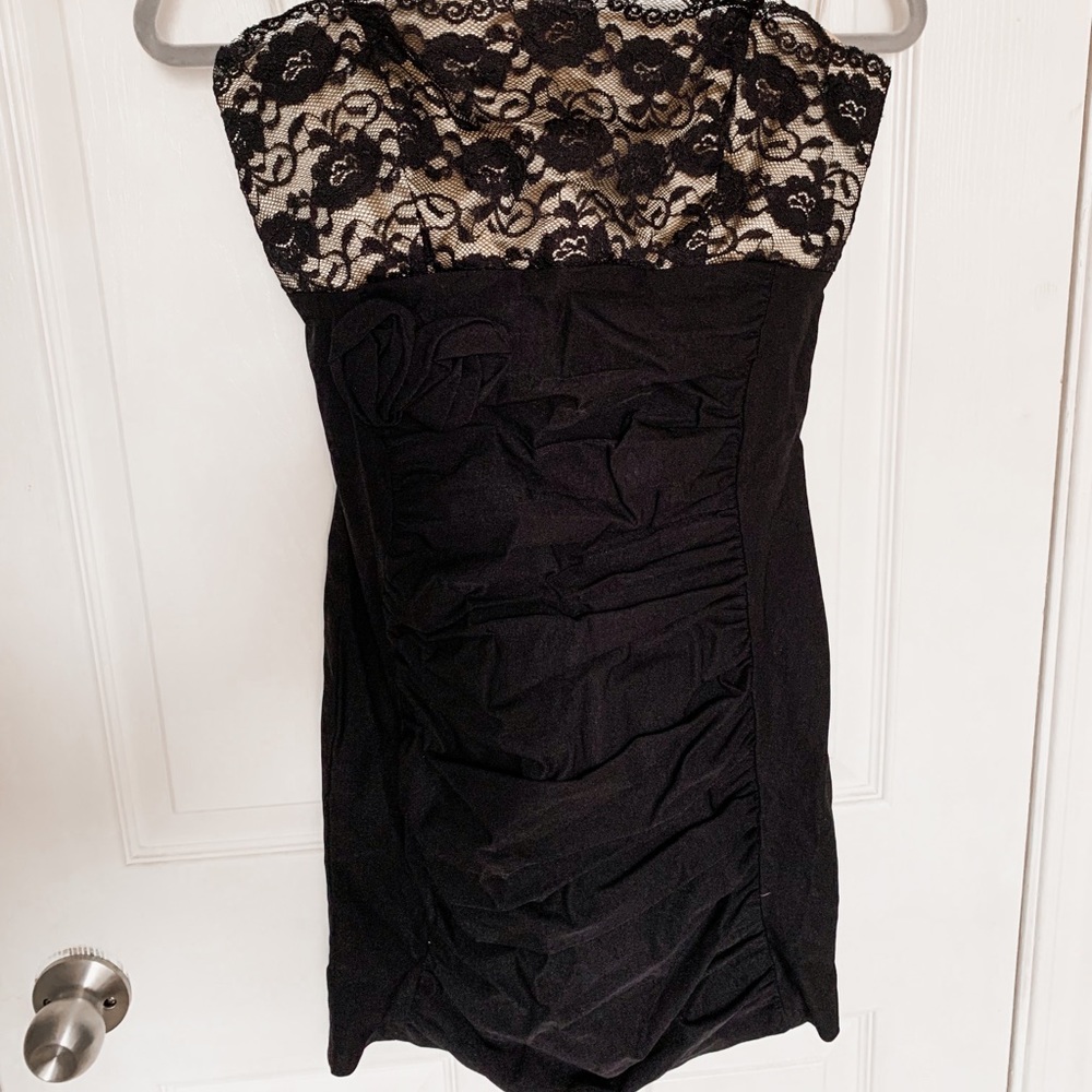 Black and Tan size medium stretchy semi formal Mystic dress.